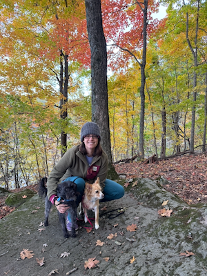Photo of Dr. King with two dogs.