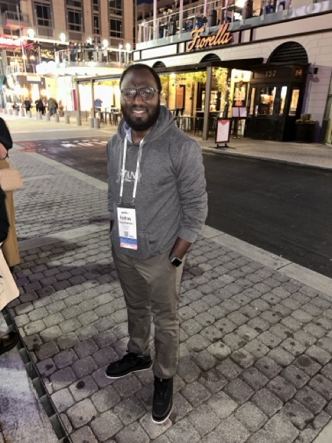 Photo of Esdras attending conference.