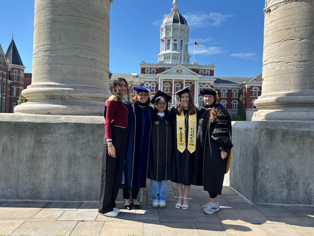 Photo of a group of graduates.